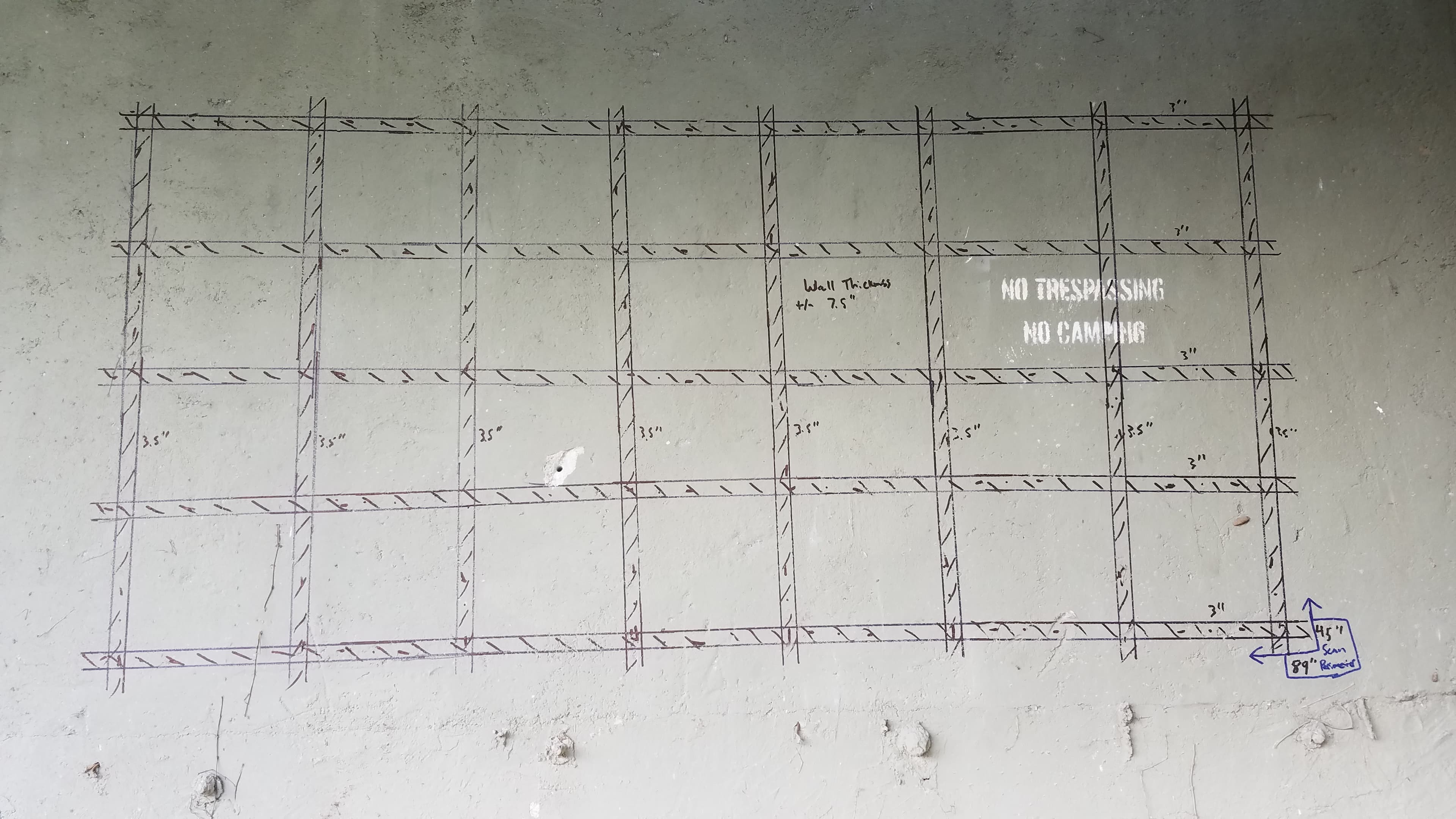 Subsurface utility locating in progress on a commercial site.