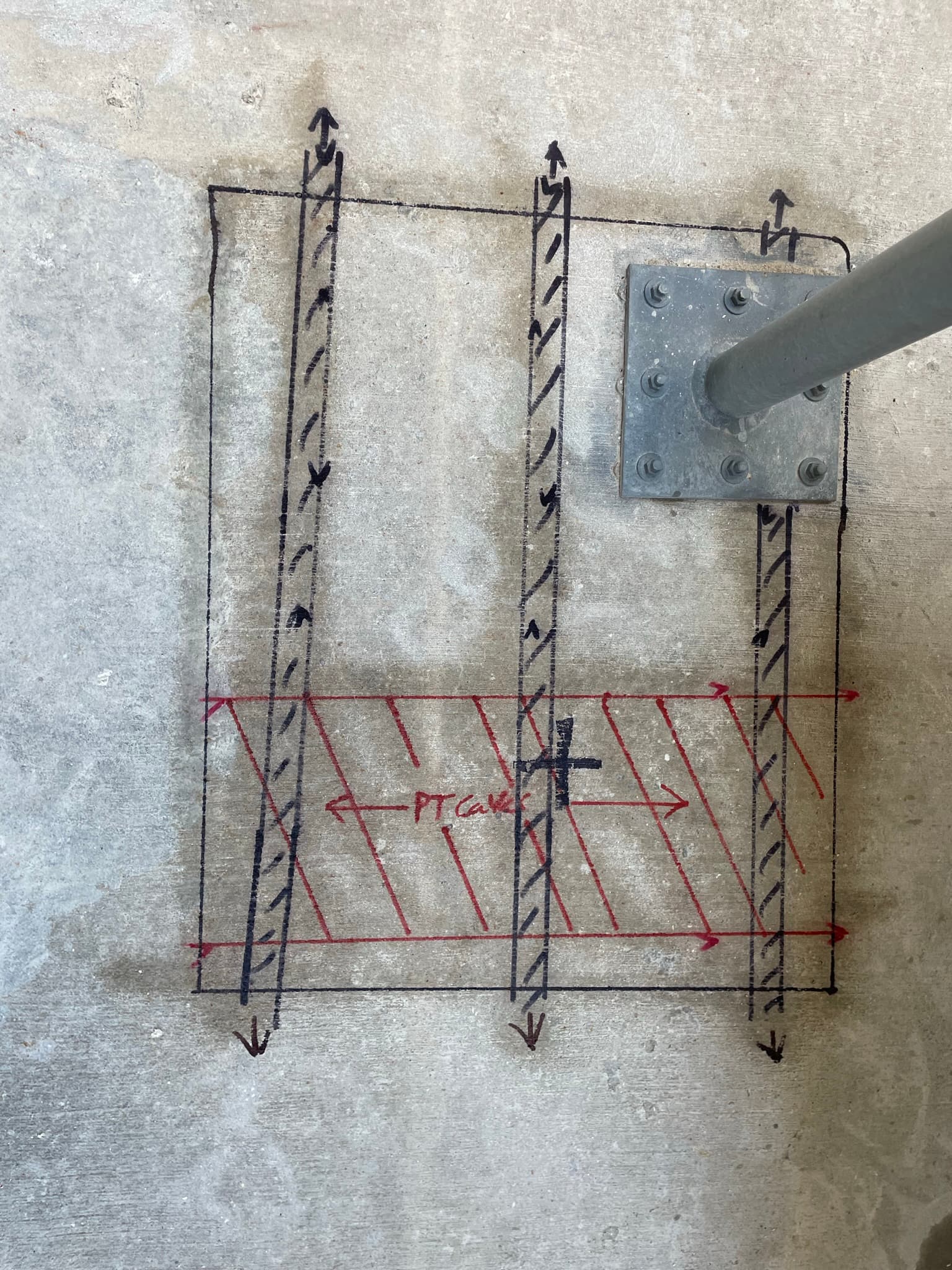 Marking located utilities with spray paint after a successful scan.