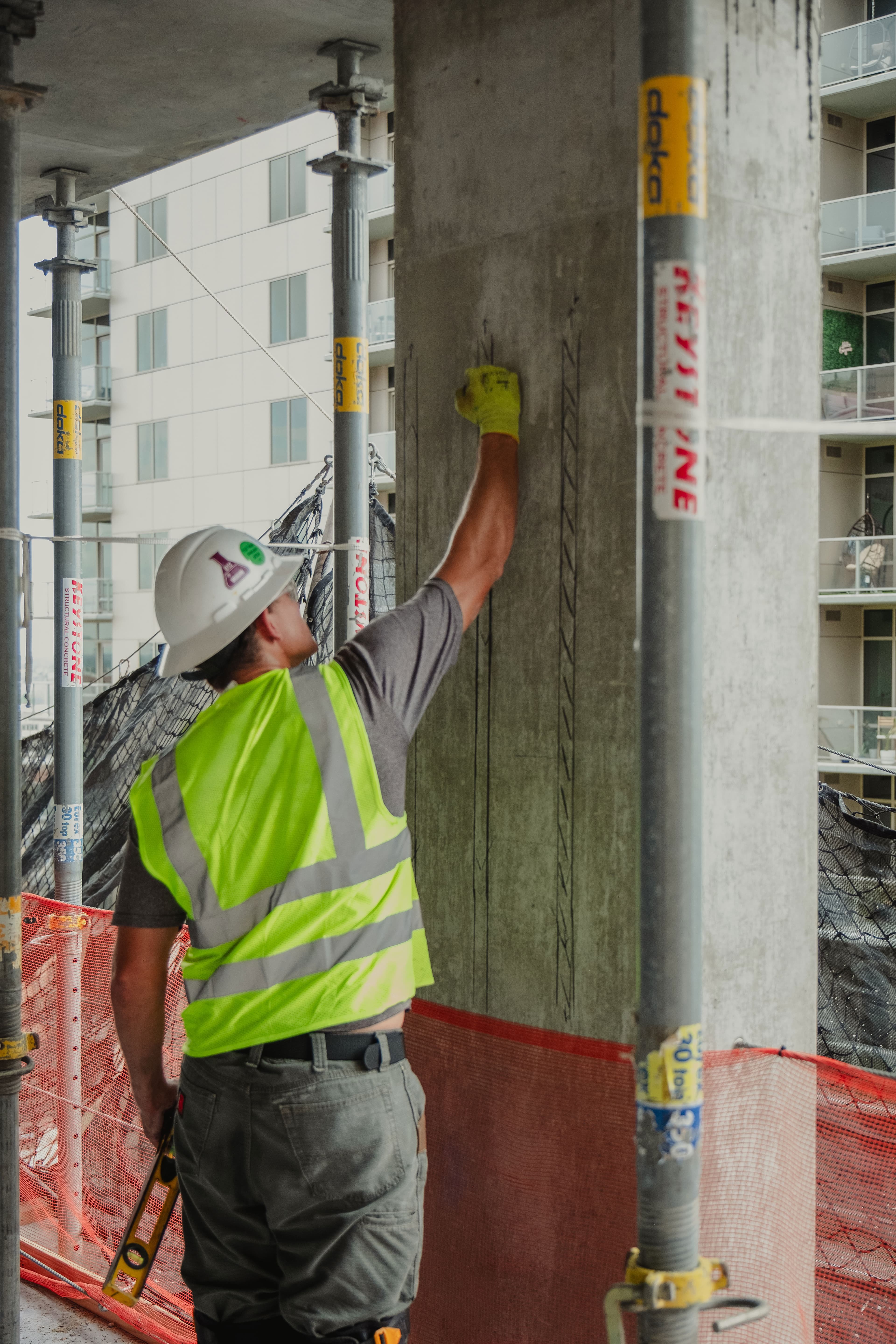 A GPR/EM specialist analyzing project requirements on a construction site.